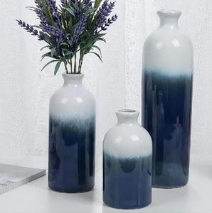 NWOT Set of 3 ceramic multiple sized blue and white vases